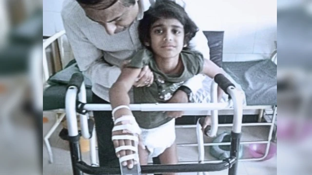 Will spine surgery help this child to walk again?